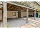 Basement of home with rock foundation, wood supports and stone pavers at 290 Georgia Se Ave, Atlanta, GA 30312