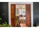 Elegant wood sliding doors open to light, bright kitchen from the living room at 290 Georgia Se Ave, Atlanta, GA 30312