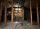 Shows an unfinished attic space with wood floors and exposed beams at 3008 Grand Sw Ave, Atlanta, GA 30315