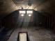 Shows an unfinished attic space with exposed beams and water damage on the ceiling at 3008 Grand Sw Ave, Atlanta, GA 30315