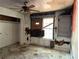 A view of a bedroom needing repairs including damaged walls, and a boarded up window at 3008 Grand Sw Ave, Atlanta, GA 30315