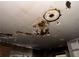 A view of a ceiling needing repairs including missing drywall and exposed rafters at 3008 Grand Sw Ave, Atlanta, GA 30315