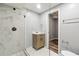Bathroom featuring stunning marble-patterned tile in the walk-in shower at 3275 Aldrich Dr, Cumming, GA 30040