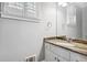Bathroom featuring a granite countertop on a white vanity at 3275 Aldrich Dr, Cumming, GA 30040