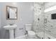 Bright bathroom with a walk-in shower and stylish vanity sink at 3275 Aldrich Dr, Cumming, GA 30040