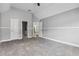 A bedroom featuring a large closet and an open doorway to the landing area at 3275 Aldrich Dr, Cumming, GA 30040