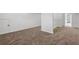 Large walk-in closet with custom shelving offering ample storage with easy access to the main bedroom at 3275 Aldrich Dr, Cumming, GA 30040