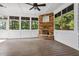 Outdoor patio featuring a stone fireplace and views of the green backyard at 3275 Aldrich Dr, Cumming, GA 30040