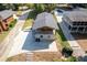 Stunning aerial shot highlighting the home's features and landscaping from an elevated view at 6160 Lake Lanier Heights Rd, Buford, GA 30518