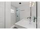 Modern bathroom with a glass enclosed shower and elegant marble countertop at 6160 Lake Lanier Heights Rd, Buford, GA 30518