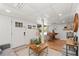 Bright recreation room with a fireplace, comfortable seating, and an access door to a patio at 6160 Lake Lanier Heights Rd, Buford, GA 30518
