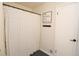 Cozy bathroom features black and white decor, with shower and dark hardware at 1643 Cumberland Trce, Acworth, GA 30102