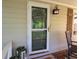 Inviting front door with a wreath, creating a warm and welcoming entrance at 1643 Cumberland Trce, Acworth, GA 30102