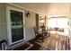 Inviting front porch with rocking chairs and a porch swing, perfect for relaxing at 1643 Cumberland Trce, Acworth, GA 30102