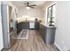 Well-lit kitchen featuring stainless steel appliances, granite countertops, and stylish two-tone cabinetry at 1643 Cumberland Trce, Acworth, GA 30102