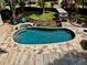 Gorgeous backyard with private in-ground pool, stone surround, spa, and wooden deck at 1643 Cumberland Trce, Acworth, GA 30102