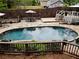 Backyard featuring an in-ground pool, patio, and tiered deck, perfect for entertaining at 1643 Cumberland Trce, Acworth, GA 30102