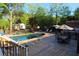 The backyard features a pristine pool with an expansive deck, perfect for entertaining and relaxation at 1643 Cumberland Trce, Acworth, GA 30102