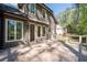 Wooden deck with white railings provides scenic backyard views, accessible from the home's exterior at 2050 Heritage Green Dr, Marietta, GA 30064