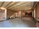 Spacious unfinished basement with exposed framing, concrete floor, and insulated ceiling, ready to be customized at 2050 Heritage Green Dr, Marietta, GA 30064