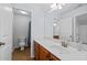 Bathroom with a vanity, sink, mirror, toilet, and shower with a blue curtain at 2050 Heritage Green Dr, Marietta, GA 30064