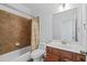 Bathroom featuring tile shower, bath, toilet, and vanity with a sink at 2050 Heritage Green Dr, Marietta, GA 30064