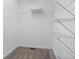 Spacious walk-in closet featuring white wire shelving and gray carpet at 2050 Heritage Green Dr, Marietta, GA 30064