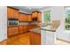 Kitchen with granite countertops, stainless steel appliances, and hardwood floors at 2050 Heritage Green Dr, Marietta, GA 30064