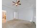 Large main bedroom with carpet, ceiling fan, and access to the ensuite bathroom at 2050 Heritage Green Dr, Marietta, GA 30064