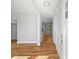 Inviting foyer with hardwood floors, neutral walls, and plenty of natural light at 3205 Tackett Rd, Douglasville, GA 30135