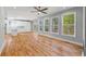 Open-concept living room features hardwood floors and lots of natural light at 3205 Tackett Rd, Douglasville, GA 30135