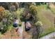 A high angle aerial view of the homes nestled in a rural wooded community at 434 Mac Johnson Nw Rd, Cartersville, GA 30121