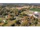 Overhead view of community with wooded areas and school at 434 Mac Johnson Nw Rd, Cartersville, GA 30121