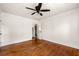 Bedroom featuring hardwood floors, ceiling fan, and neutral walls at 434 Mac Johnson Nw Rd, Cartersville, GA 30121