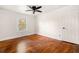 Bright bedroom with natural light, neutral walls, and hardwood floors at 434 Mac Johnson Nw Rd, Cartersville, GA 30121