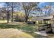 Lawn and yard around a house with a metal awning in a partially wooded setting at 434 Mac Johnson Nw Rd, Cartersville, GA 30121