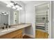 Bathroom with granite countertop vanity and walk in closet at 4430 Tilly Mill Rd # 1304, Atlanta, GA 30360