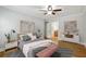 Cozy bedroom with ceiling fan, wood floors, and stylish decor at 4430 Tilly Mill Rd # 1304, Atlanta, GA 30360