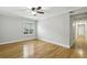 Bedroom with hardwood floors, neutral paint, and bright window at 4430 Tilly Mill Rd # 1304, Atlanta, GA 30360
