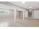 The spacious basement features tiled floors, natural light, and structural columns at 294 Arnold Mill Rd, Woodstock, GA 30188