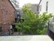 View from deck of building exterior showing deck access and surrounding greenery at 3091 Colonial Way # B4, Atlanta, GA 30341