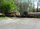 Brick building near parking lot with meticulously maintained greenery at 3091 Colonial Way # B4, Atlanta, GA 30341