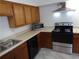 Well-equipped kitchen with stainless steel appliances, wooden cabinets and laminate counter tops at 3091 Colonial Way # B4, Atlanta, GA 30341