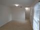 Bright, modern living area with lots of light and new laminate wood flooring at 3091 Colonial Way # B4, Atlanta, GA 30341