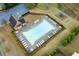 Aerial view of the community pool and playground, showcasing amenities in a well-maintained neighborhood at 3169 Shadystone Way, Loganville, GA 30052