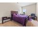 Comfortable bedroom featuring plush carpeting, and complemented by natural light at 3169 Shadystone Way, Loganville, GA 30052