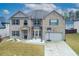 Beautiful two-story brick home featuring a well-maintained yard and attached two car garage at 3169 Shadystone Way, Loganville, GA 30052