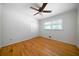 This bedroom has hardwood floors, neutral paint and a double closet at 3925 Orchard Se Rd, Smyrna, GA 30080