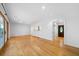 Spacious living room with hardwood floors, recessed lighting, and an open layout at 3925 Orchard Se Rd, Smyrna, GA 30080