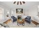 Well-lit living room features a fireplace and wood floors at 52 Lake Overlook Dr, White, GA 30184